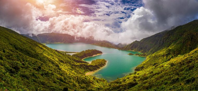 Azores panoramic view of natural landscape, wonderful scenic island of Portugal. Beautiful lagoons in volcanic craters and green fields. Tourist attraction and travel destination. Azores, Portugal.