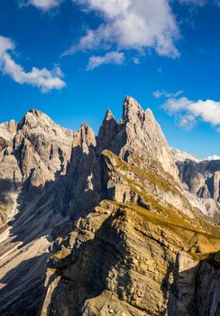View on Seceda peak. Trentino Alto Adige, Dolomites Alps, South Tyrol, Italy. Odle mountain range, Val Gardena. Majestic Furchetta peak. Odles group seen from Seceda, Santa Cristina Val Gardena.