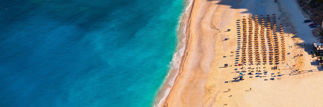 Aerial drone view of iconic turquoise and sapphire bay and beach of Myrtos, Kefalonia (Cephalonia) island, Ionian, Greece. Myrtos beach, Kefalonia island, Greece. Beautiful view of Myrtos beach.