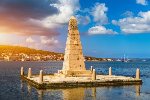 View of the De Bosset Bridge in Argostoli city on Kefalonia island. De Bosset Bridge on lakeside In Argostoli, Kefalonia. Obelisk and the de Bosset bridge in Argostoli, Kefalonia, Greece