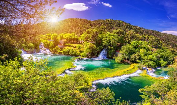 Waterfalls Krka, National Park, Dalmatia, Croatia. View of Krka National Park, Roski Slap location, Croatia, Europe. Beautiful world of Mediterranean countries. Traveling concept background.