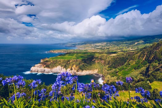 Azores panoramic view of natural landscape, wonderful scenic island of Portugal. Beautiful lagoons in volcanic craters and green fields. Tourist attraction and travel destination. Azores, Portugal.