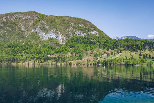 Lake Bohinj in Slovenia, beauty in nature. Colorful summer on the Bohinj lake in Triglav national park Slovenia, Alps, Europe. Mountain Lake bohinj in Julian Alps, Slovenia