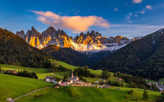 Santa Maddalena (Santa Magdalena) village with magical Dolomites mountains in background, Val di Funes valley, Trentino Alto Adige region, South Tyrol, Italy, Europe. Santa Maddalena Village, Italy. 