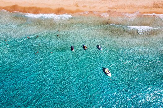 Aerial shot of beautiful turquoise beach Falasarna (Falassarna) in Crete, Greece. View of famous paradise sandy deep turquoise beach of Falasarna (Falassarna) in North West, Crete island, Greece.