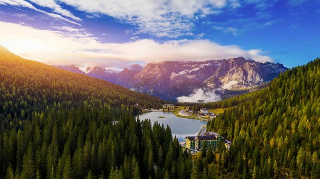 Lake Misurina or Lago di Misurina Italy. Misurina Lake with perfect sky reflection in calm water. Stunning view on the majestic Dolomites Alp Mountains, Italy, National Park Tre Cime di Lavaredo.