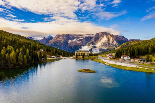 Lake Misurina or Lago di Misurina Italy. Misurina Lake with perfect sky reflection in calm water. Stunning view on the majestic Dolomites Alp Mountains, Italy, National Park Tre Cime di Lavaredo.