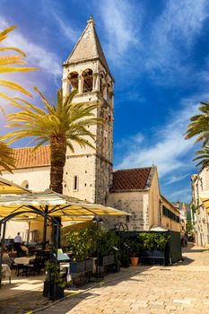 Narrow street in historic town Trogir, Croatia. Travel destination. Narrow old street in Trogir city, Croatia. The alleys of the old town of Trogir are very picturesque and full of charm. Croatia.