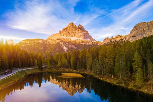 Aerial drone view of Lake Antorno (Lago di Antorno) located in Dolomites area, Belluno Province, Italy. Lake Antorno, Three Peaks of Lavaredo, Lake Antorno and Tre Cime di Lavaredo, Dolomites, Italy.