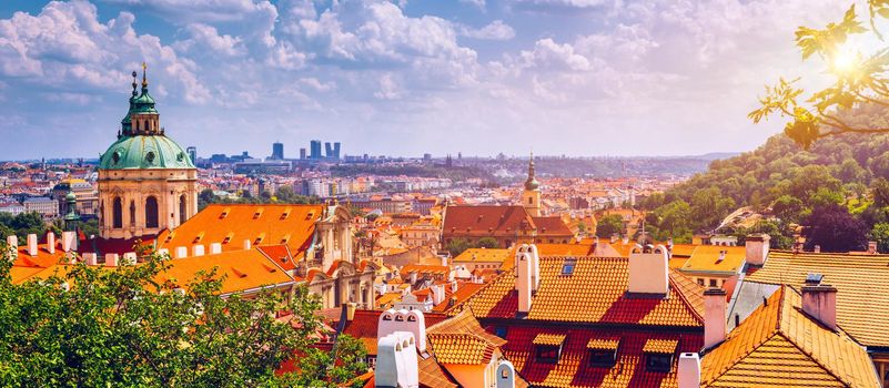 Top view to red roofs skyline of Prague city, Czech Republic. Aerial view of Prague city with terracotta roof tiles, Prague, Czechia. Old Town architecture with terracotta roofs in Prague.