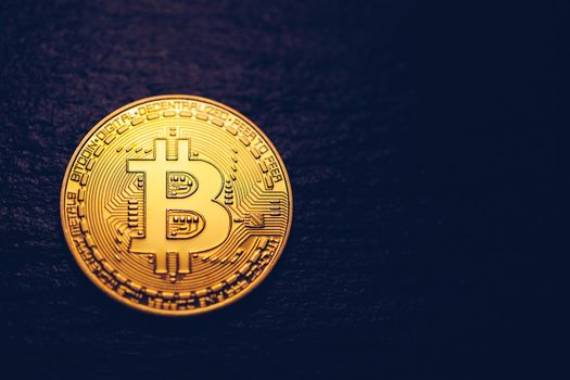 Crypto currency golden coin with bitcoin symbol on isolated on black background. Bitcoin Coin on black background. Bitcoin cryptocurrency.  Cryptocurrency Coin Concept.