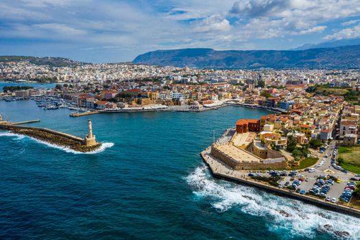 Picturesque old port of Chania. Landmarks of Crete island. Greece. Aerial view of the beautiful city of Chania with it's old harbor and the famous lighthouse, Crete, Greece.