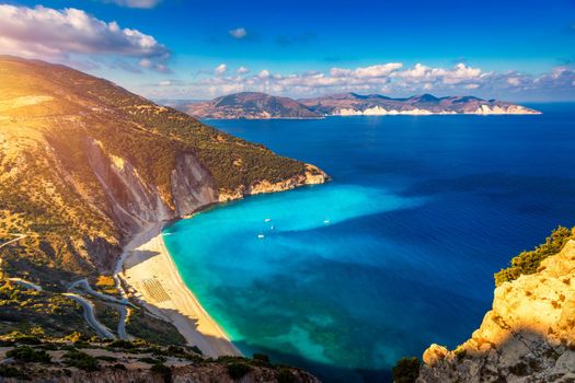 Aerial drone view of iconic turquoise and sapphire bay and beach of Myrtos, Kefalonia (Cephalonia) island, Ionian, Greece. Myrtos beach, Kefalonia island, Greece. Beautiful view of Myrtos beach.