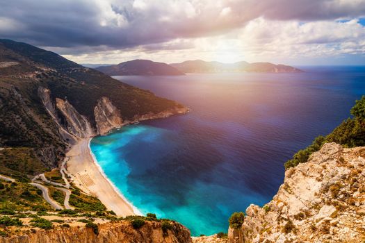 Famous Myrtos beach from overlook, Kefalonia (Cephalonia), Greece. Myrtos beach, Kefalonia island, Greece. Beautiful view of Myrtos beach, Ionian Island, Kefalonia (Cephalonia), Greece.