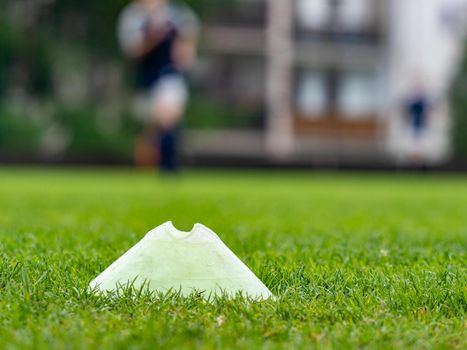 Football turf detail while Soccer Team Training on Soccer Stadium. Dribbling soccer ball