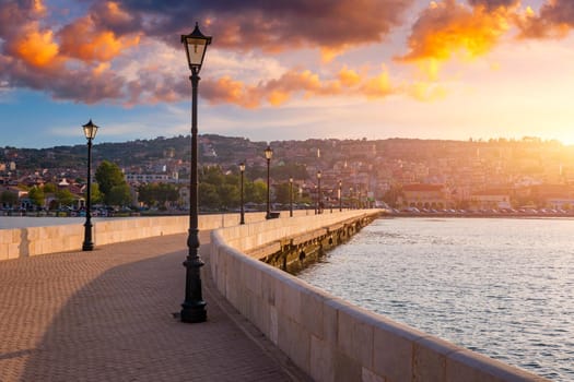 View of the De Bosset Bridge in Argostoli city on Kefalonia island. De Bosset Bridge on lakeside In Argostoli, Kefalonia. Obelisk and the de Bosset bridge in Argostoli, Kefalonia, Greece