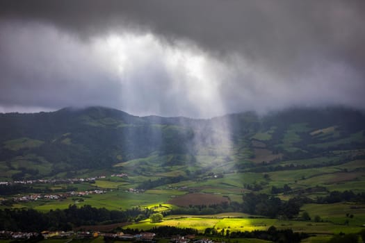 Azores panoramic view of natural landscape, wonderful scenic island of Portugal. Beautiful lagoons in volcanic craters and green fields. Tourist attraction and travel destination. Azores, Portugal.