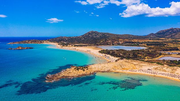 Panorama of the wonderful beaches of Chia, Sardinia, Italy. View of beautiful Chia bay and wonderful beaches, Sardinia island, Italy. Beautiful sea and bay on Su Guideu beach, Sardinia island, Italy