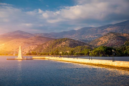 View of the De Bosset Bridge in Argostoli city on Kefalonia island. De Bosset Bridge on lakeside In Argostoli, Kefalonia. Obelisk and the de Bosset bridge in Argostoli, Kefalonia, Greece