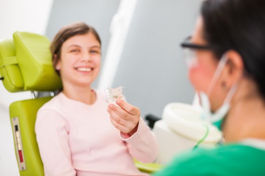 Little girl is ready to wear braces.