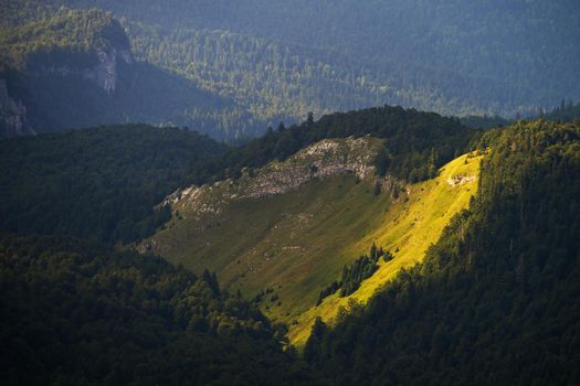 Sunbeam on hillside in mountain