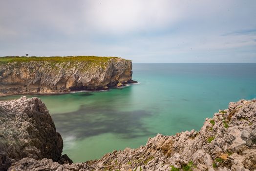 Image of scenic beach es of Torimbia and Toranda, Asturias, Spain.
