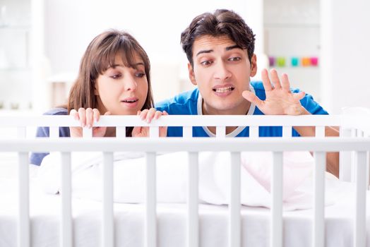 Young family frustrated at baby crying