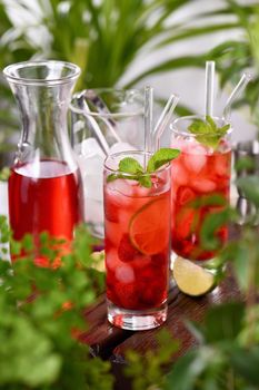 Strawberry summer cocktail or lemonade. Refreshing organic soft drink with ripe berries in a glass