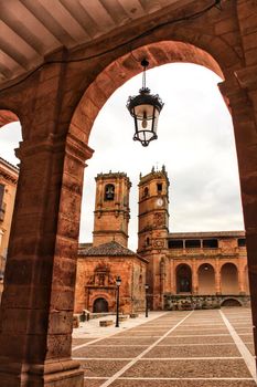 Renaissance square in Alcaraz called Plaza Mayor with the Tardon and the Trinidad Towers.