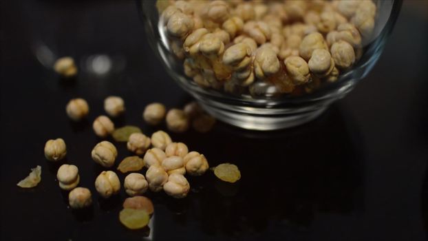 3d illustration - Raisins And Chickpea Macro View in glased Bowl