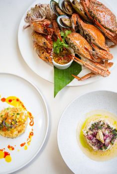 Set of Thai seafood popular menu setting on white table