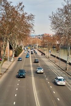 Car road on the bank of the river.