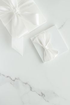 Romantic celebration, lifestyle and holiday present concept - Luxury wedding gifts on marble