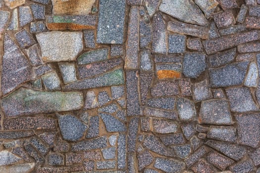 abstract flat texture and background of granite pieces mosaic.
