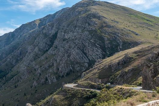 View of the Franschhoek Pass in the Western Cape Province. A vehicle is visible