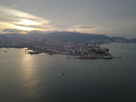 Aerial view two boats move at the sea of Penang island.