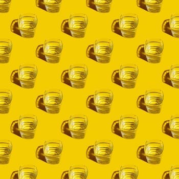 Seamless pattern of glasses with water on a yellow background. For printing posters on fabric.