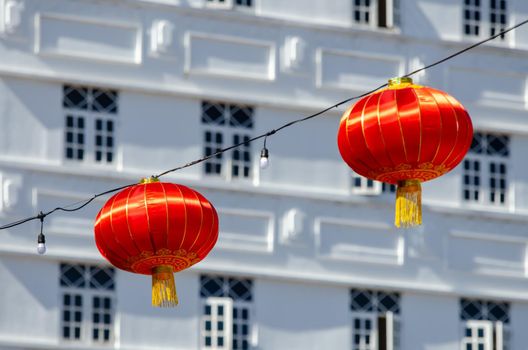 Red lantern with colonial building at back at Georgetown, Pulau Pinang.