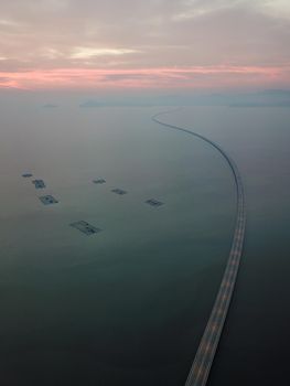 Aerial view Sultan Abdul Halim Muadzam Shah Bridge. Colorful sunset hour.