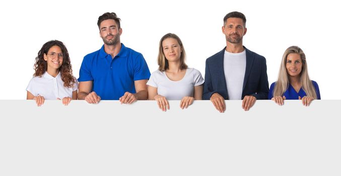 Group of hapy people standing together and holding a blank sign for your text, isolated on white background