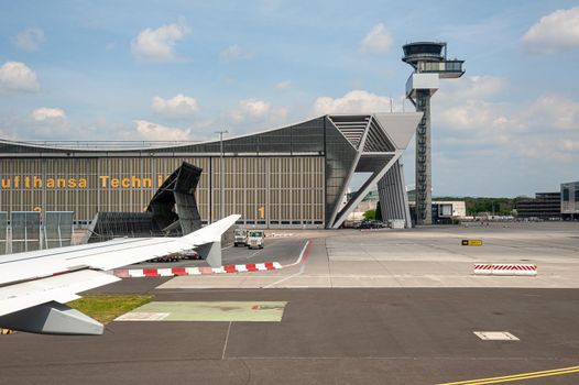 05/26/2019. Frankfurt Airport, Germany. Lufthansa Technik maintenance hangar with control tower. Airport operated by Fraport and serves as the main hub for Lufthansa including Lufthansa City Line and Lufthansa Cargo.