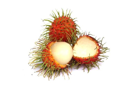 Sweet rambutan, the popular fruit of Thailand Peel off the bark to reveal the inside. isolated from a white background
