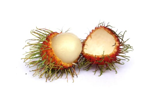 Sweet rambutan, a popular fruit of Thailand, is peeled off to reveal the inside, separated from a white background.