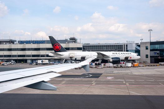 05/26/2019. Frankfurt Airport, Germany. Transatlantic Air Canada airplane in front of main terminal. Airport operated by Fraport and serves as the main hub for Lufthansa including Lufthansa City Line and Lufthansa Cargo.