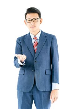 Young asian businessman portrait in suit and wear glasses over white background