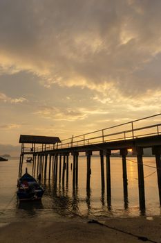 George Town, Penang/Malaysia - Mar 26 2017: Fisherman boat park beside jetty during sunset.