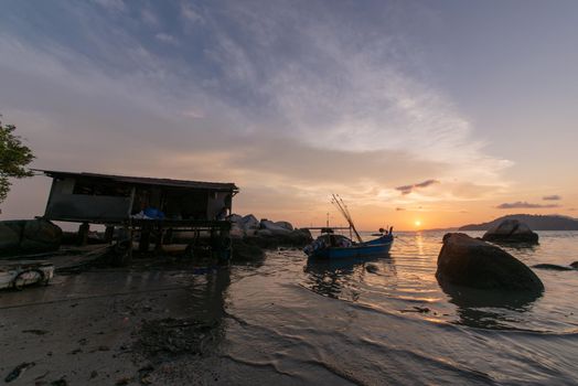 George Town, Penang/Malaysia - Mar 12 2017: Sunset view over wooden house at Pematang Damar Laut.