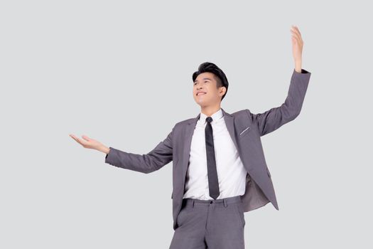 Portrait businessman in suit standing with win success isolated on white background, young asian business man is manager or executive having confident and excited is positive, expression and emotion.