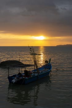 George Town, Penang/Malaysia - Feb 26 2017: A boat at sea during beautiful sunset.