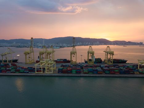 Bukit Mertajam, Penang/Malaysia - May 08 2019: Aerial view sunset hour at container terminal. Background is Penang Island.